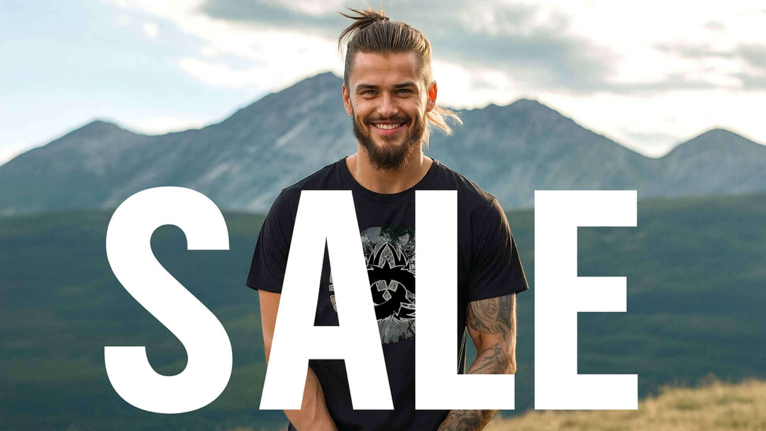 Herren Shirts im SALE Kategoriebild. Ein Mann im Runental Look, steht von einer mystischen Gebirgskette.