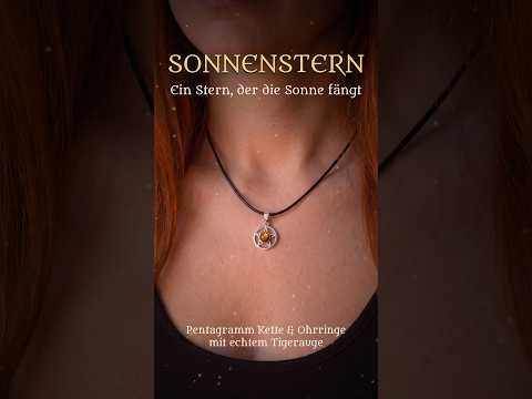 Video: Sonnenstern Pentagramm Kette und Ohrringe mit Tigerauge, getragen im warmen Abend- und Kerzenlicht