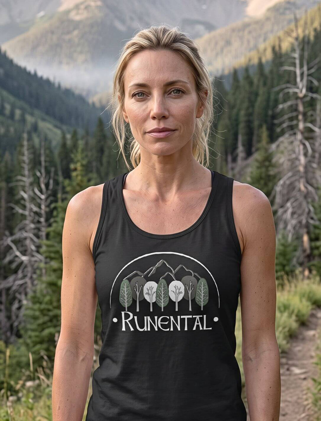 Frau im schwarzen Damen Tank Top auf einem Wanderweg im Bergtal
